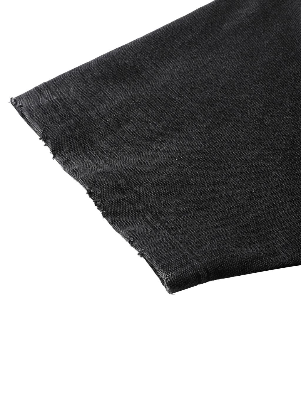 Close-up of black denim fabric with a white background
